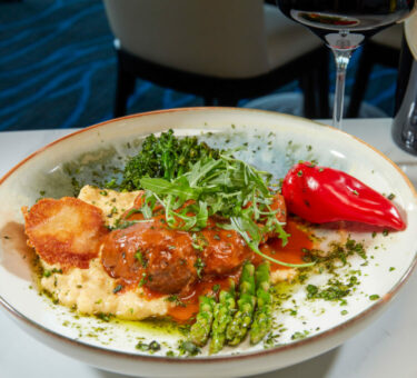 Windows on Aruba meatball dish with monte piazzo wine
